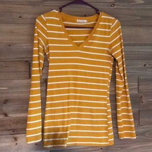 white and mustard striped top